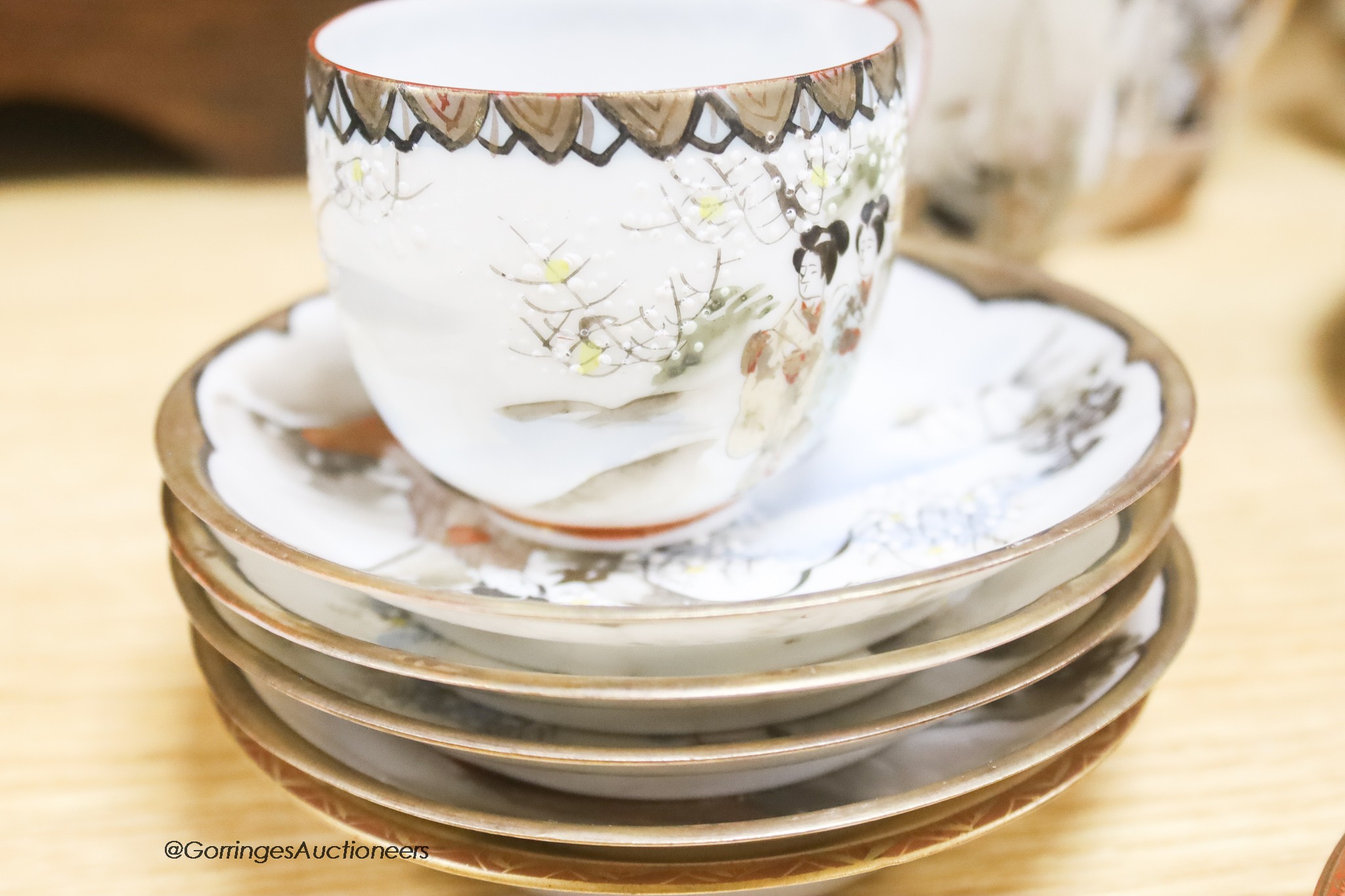 A group of various Japanese Meiji period cup and saucers